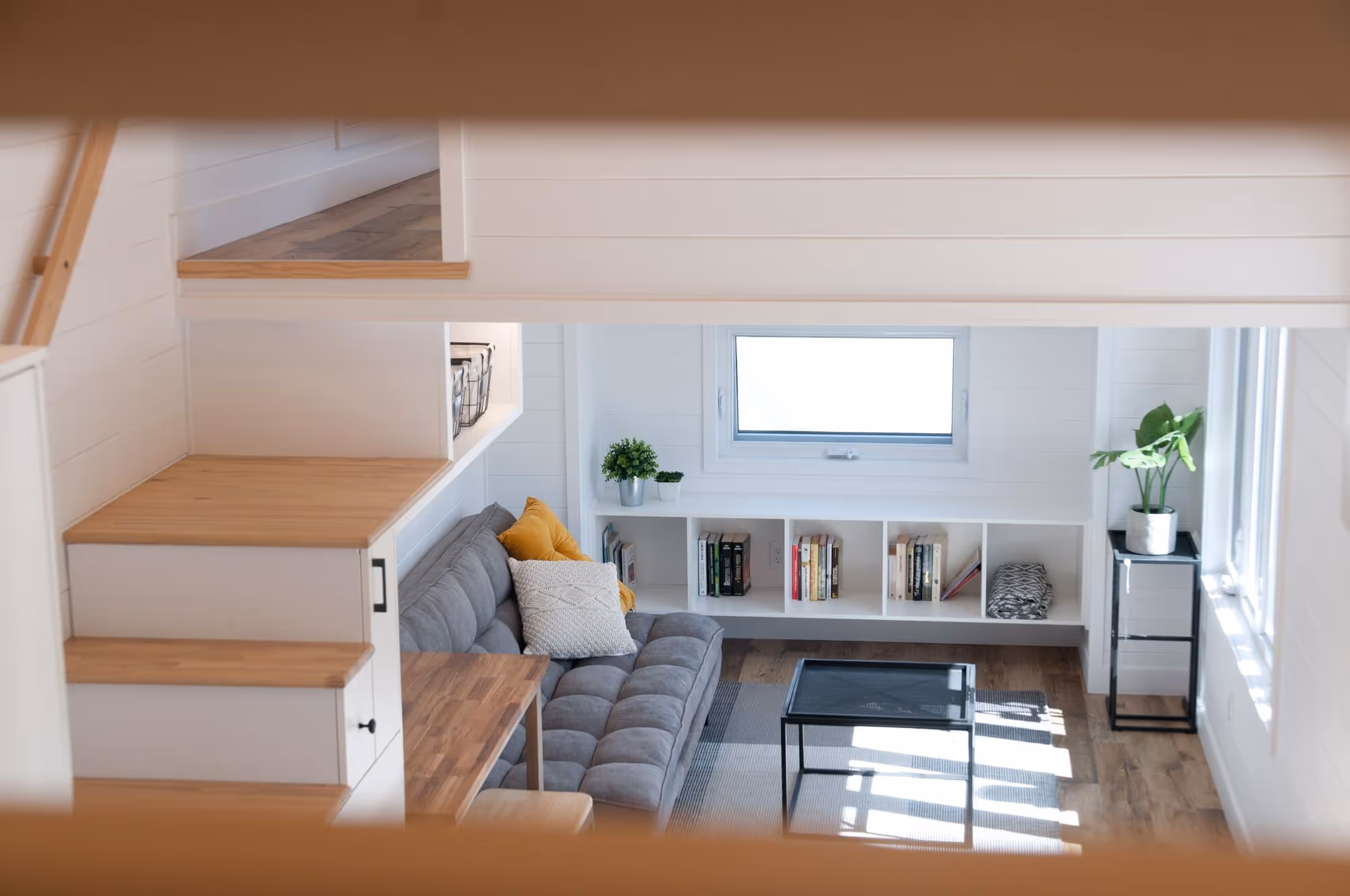 Ebene modern tiny home interior warm sunlight open space with furniture