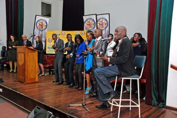 Education Matters students and faculty celebrate in Zimbabwean academic excellence ceremony together.