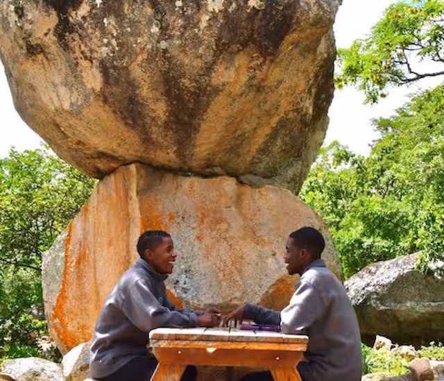 Students sat at a picnic table