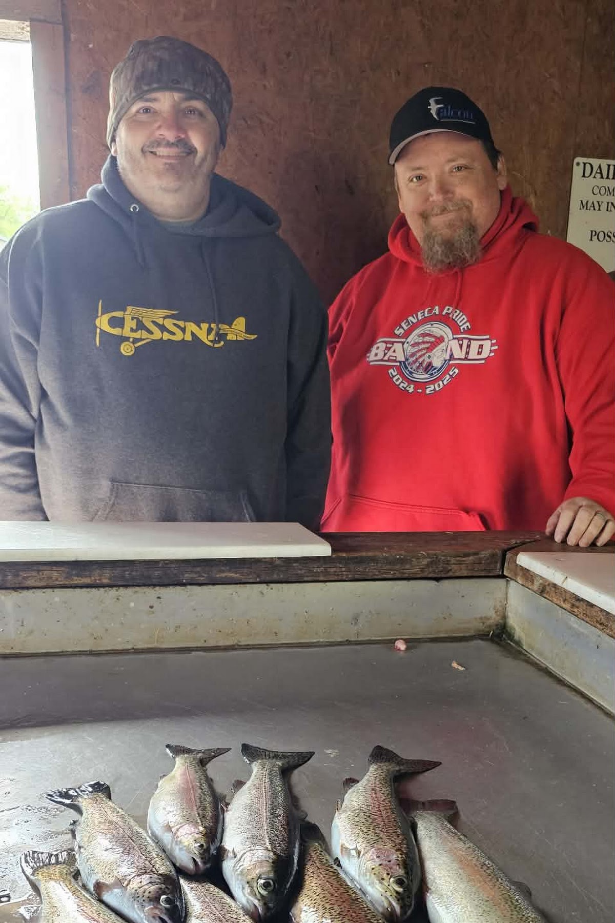 Lake Taneycomo anglers with trout caught in July 2026