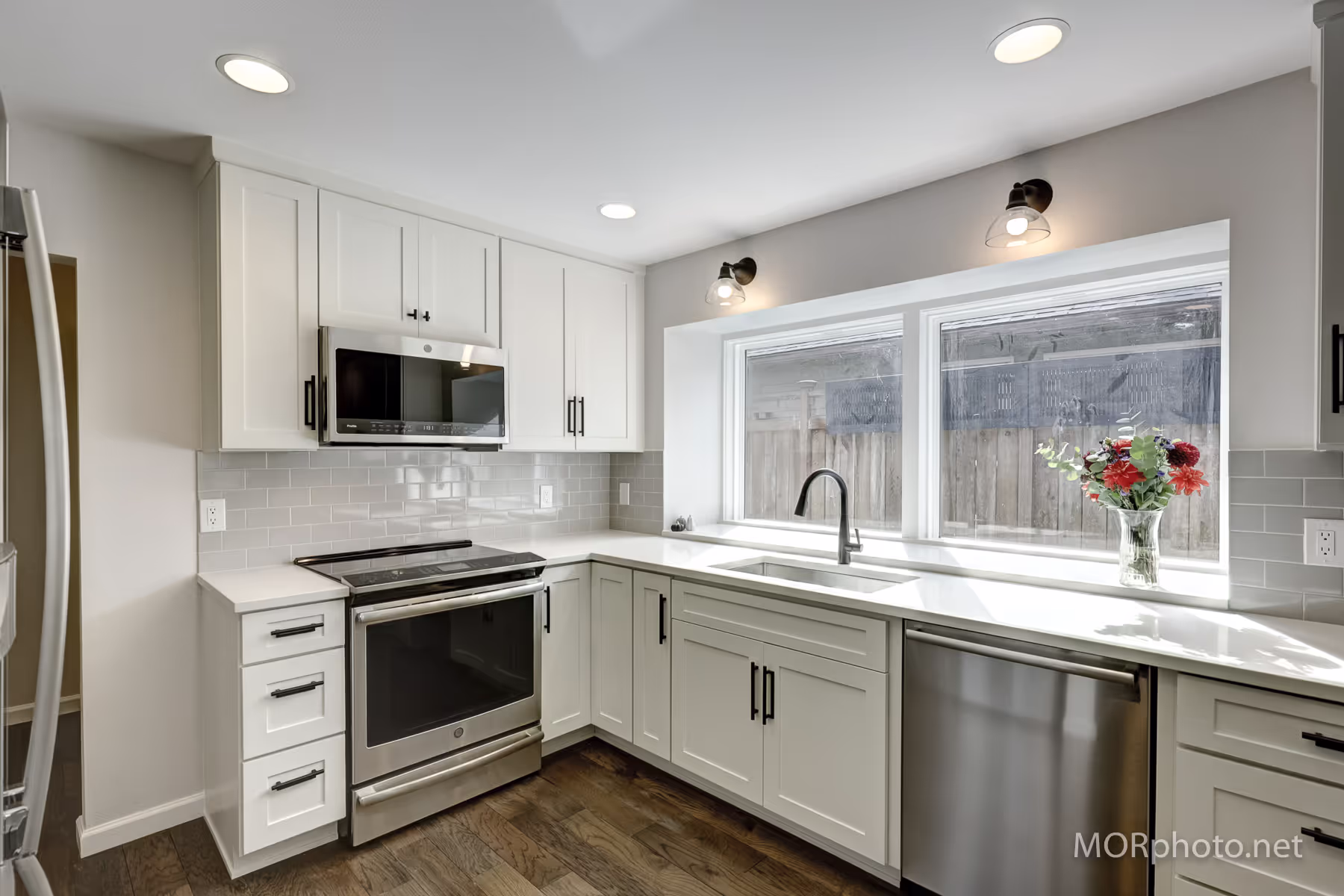 white shaker cabinets gray back splash quartz counters se portland