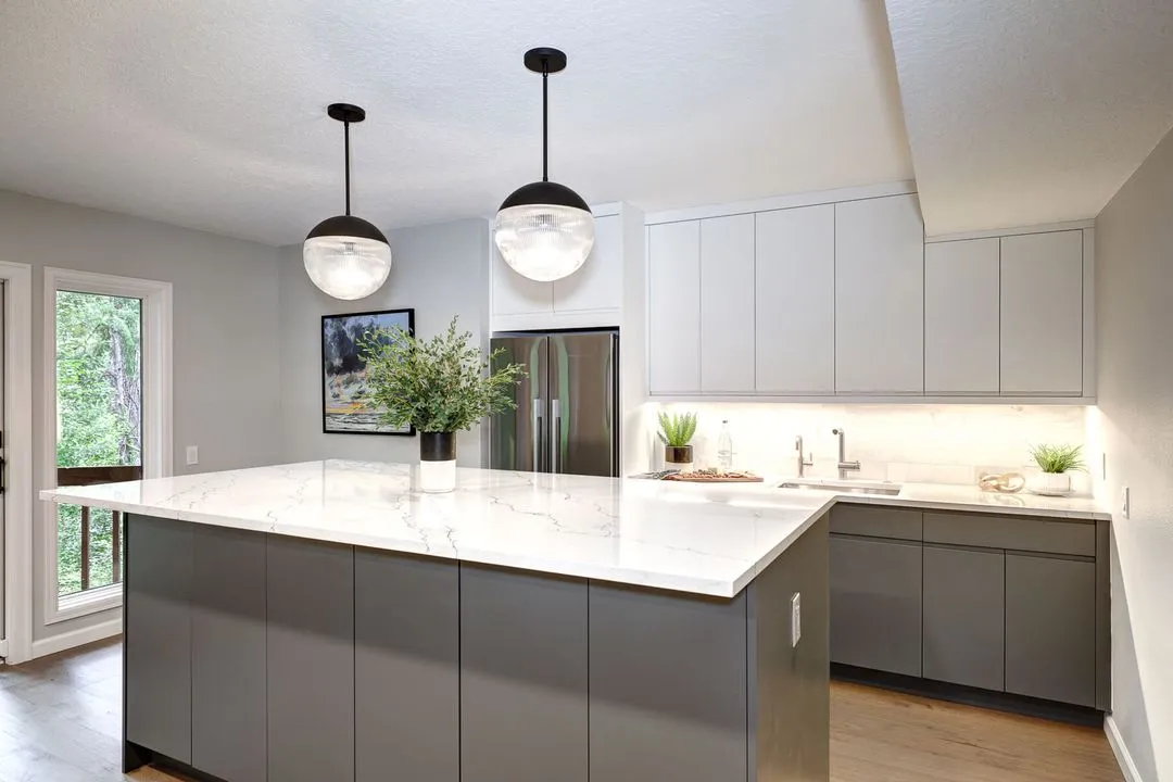 Transitional kitchen neutral colors gold hardware 