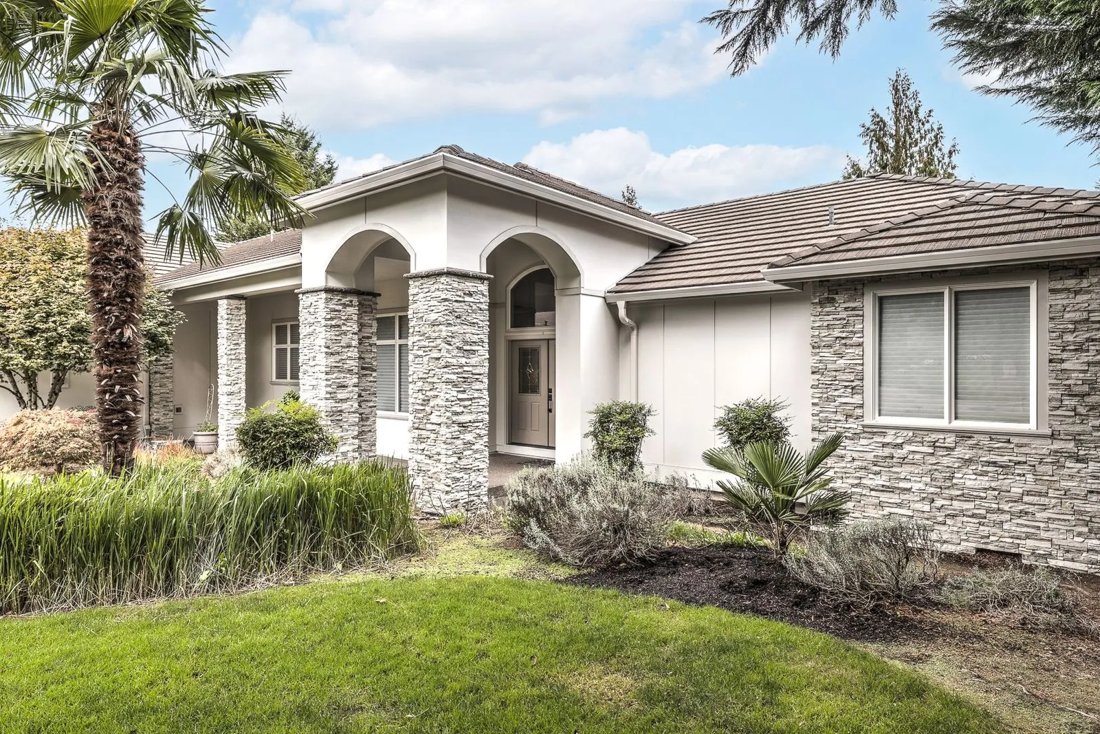 Portland EIFS replacement project with Hardieplank Architectural panel, and Cultured Stone.