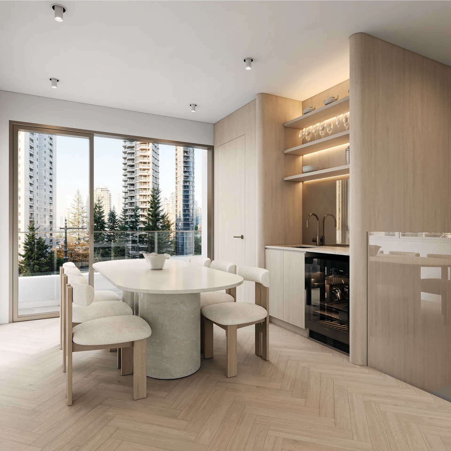 Modern dining area with oval white table, six cushioned chairs, wood floor, built-in cabinetry with glassware, and large window showing city buildings and trees outside.
