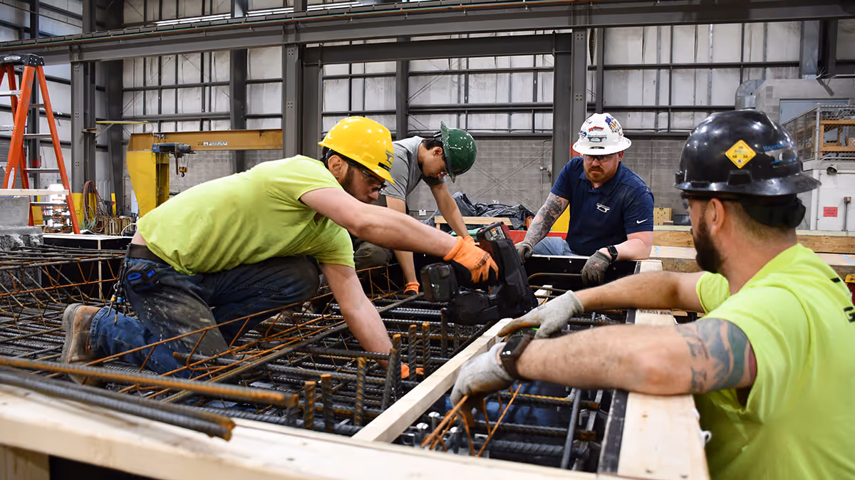Brayman Precast workers tying reinforcing bar