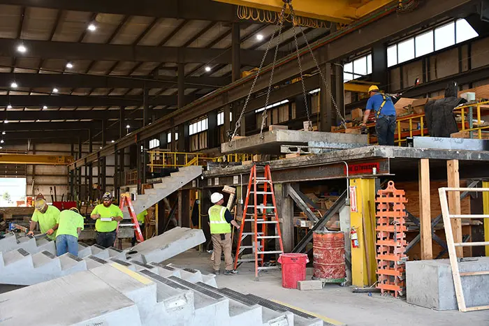 Men working on bridge setting rebar