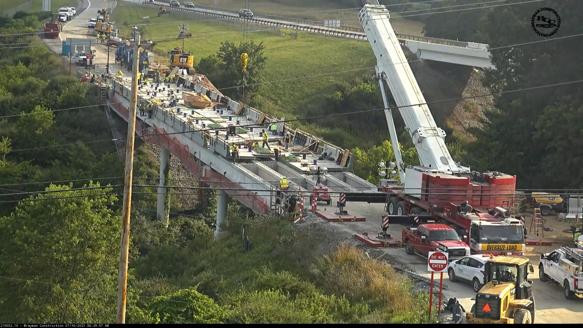 Bridge construction with Brayman workers and crane