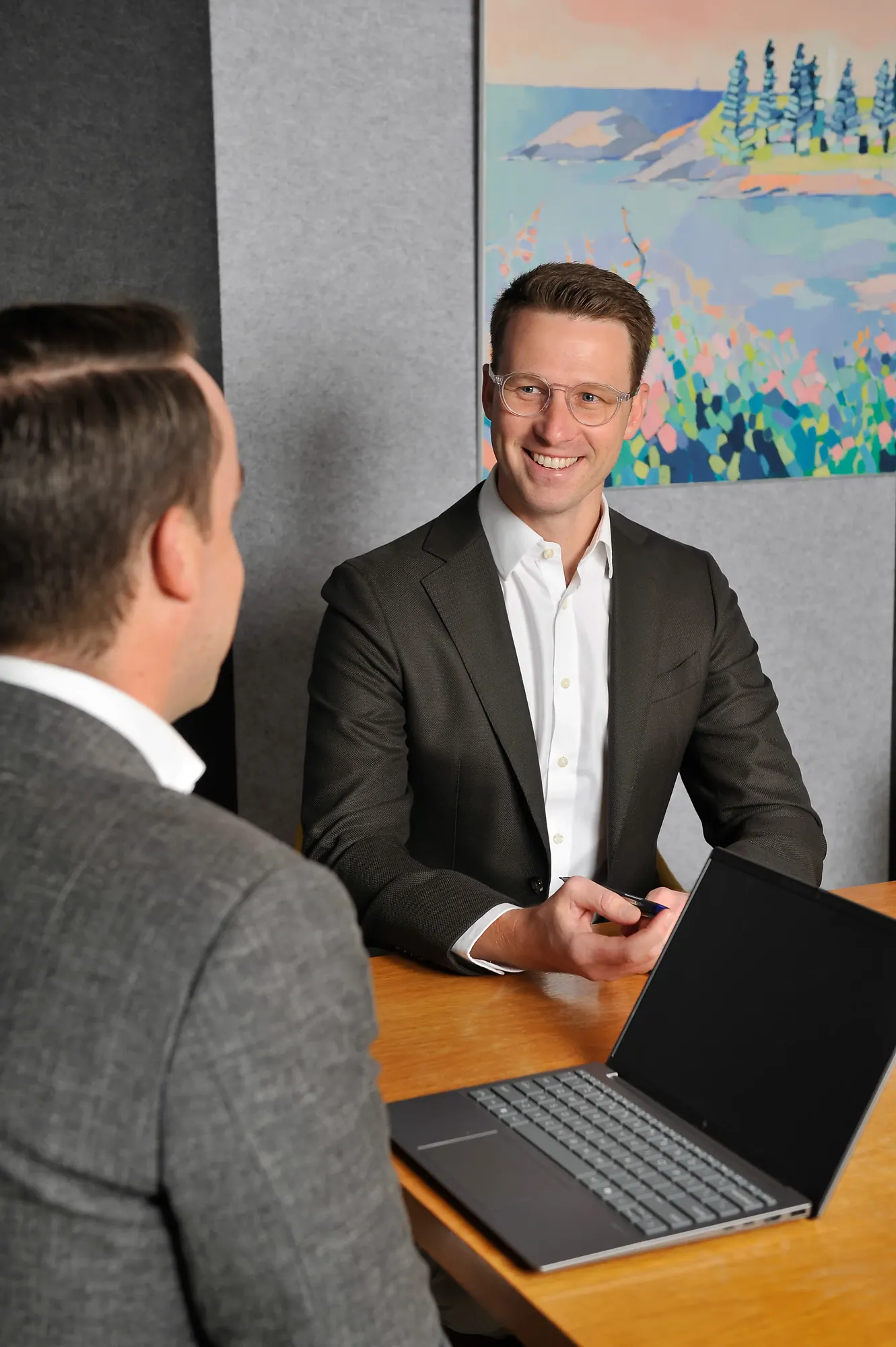 Michael Fennell providing financial planning advice to clients at Coastal Capital Advice