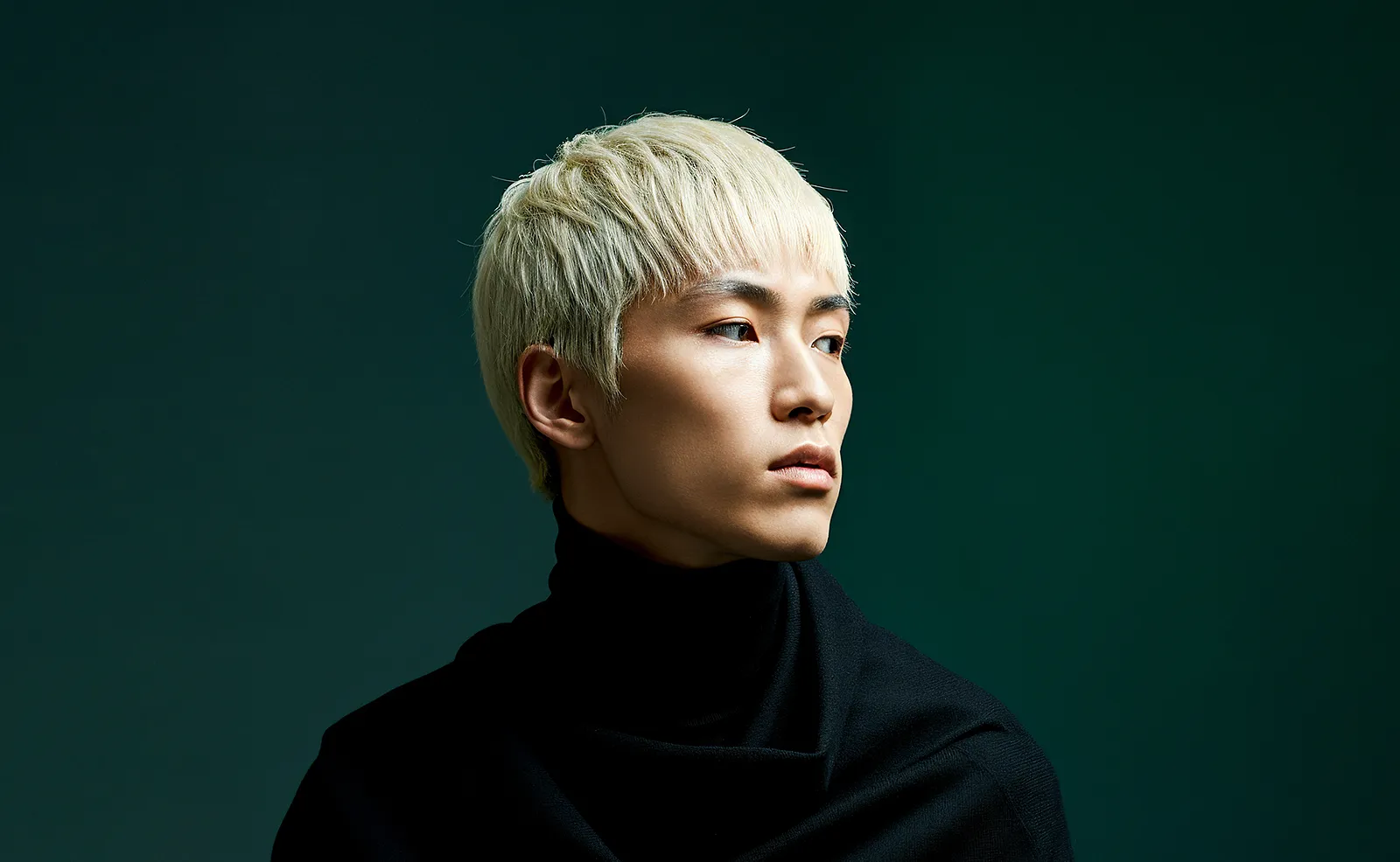 man with green background