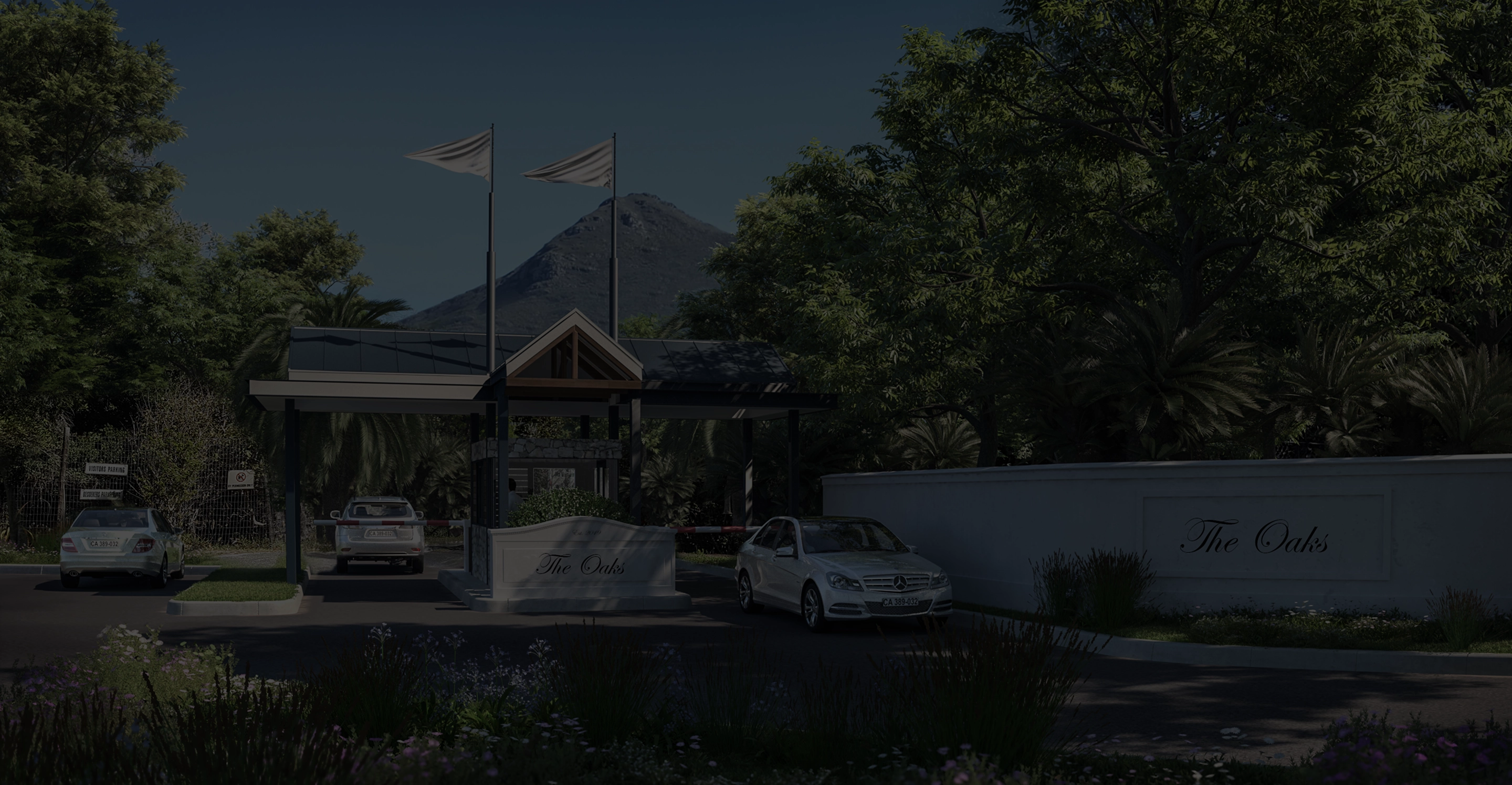 Entrance gate of The Oaks estate in Cape Town with luxury cars and mountain backdrop.
