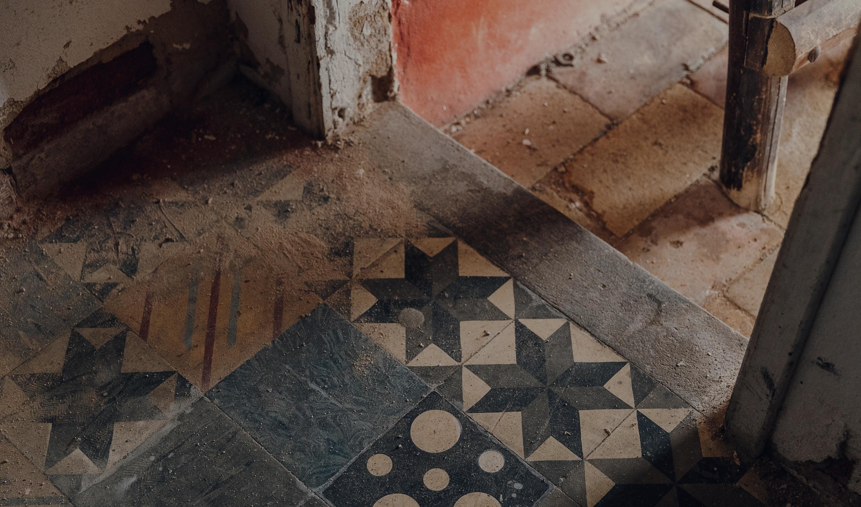 Close-up of vintage patterned floor tiles inside a traditional Portuguese property.
