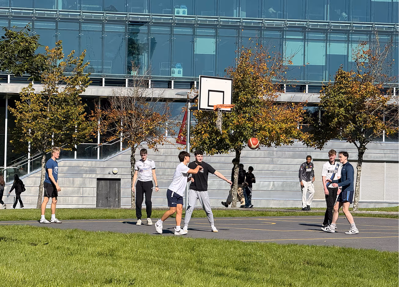 Students at UOG playing basketball