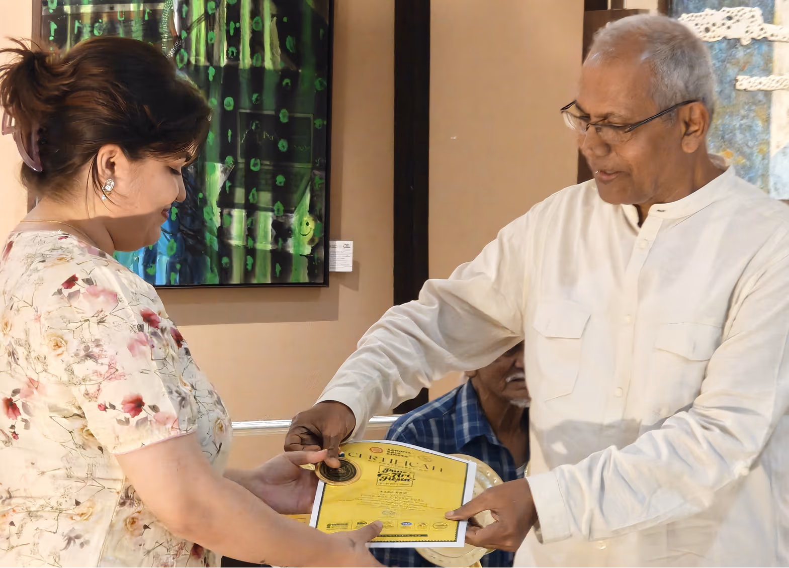 Aadi receives a certificate from Mr. Dilip Kadam.