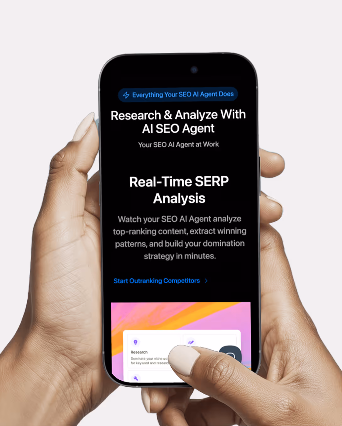 A hand-held mobile mockup of Writesonic's landing page, made responsive on Webflow.