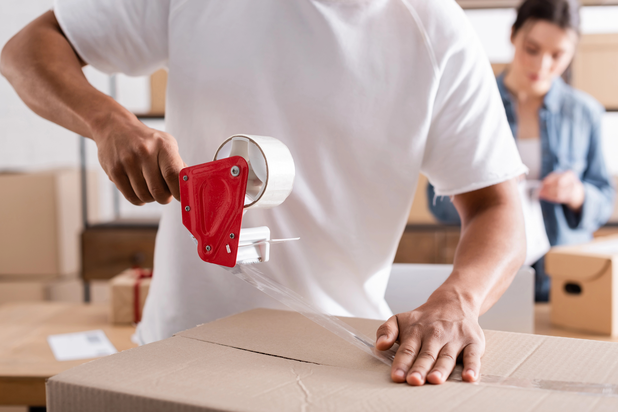 Warehouse staff managing in-house product packaging operations