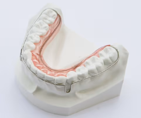 Wrap around retainer for lower jaw orthodontic retention - H32 Dental