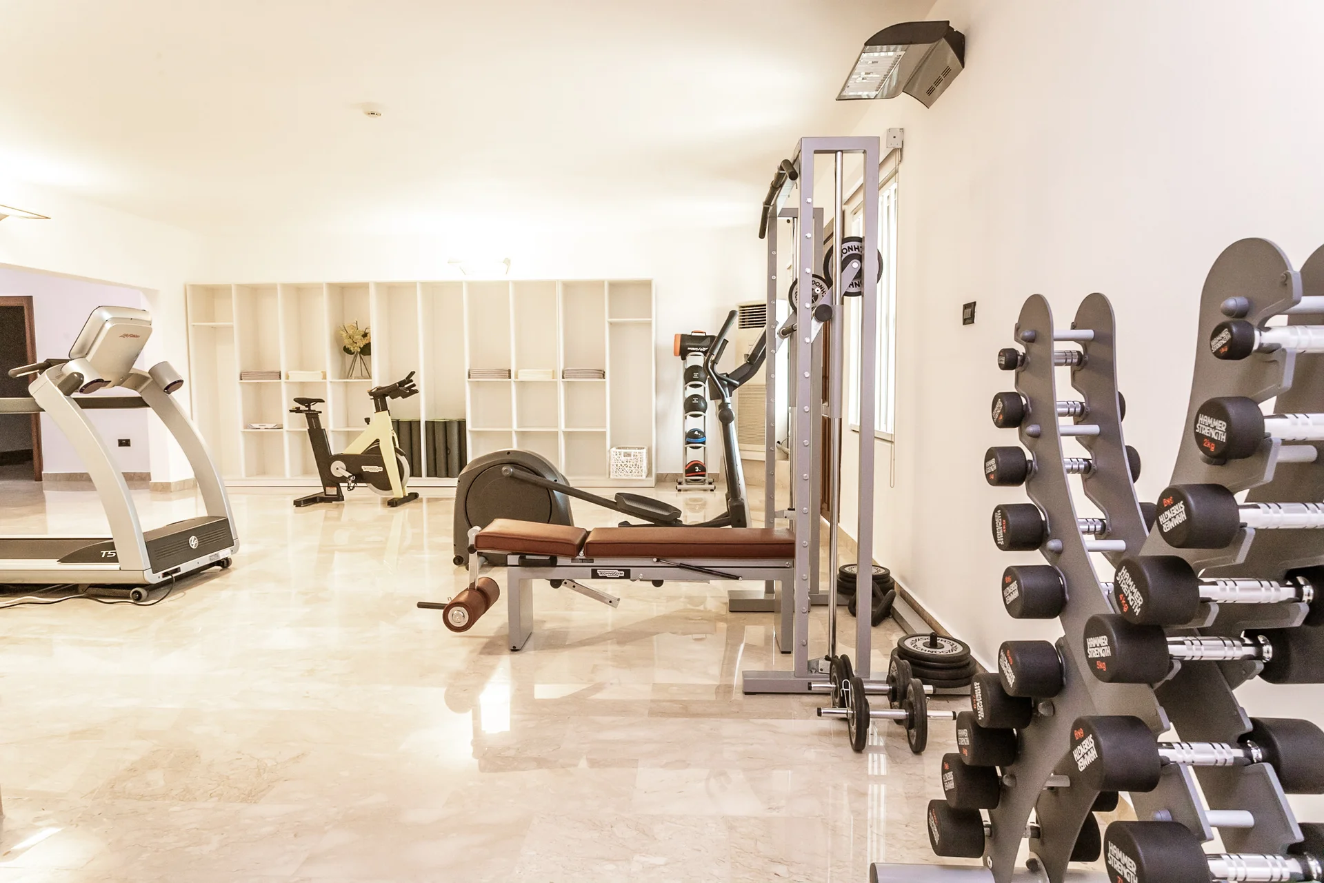 Woman stretching in the gym in Amana Retreats