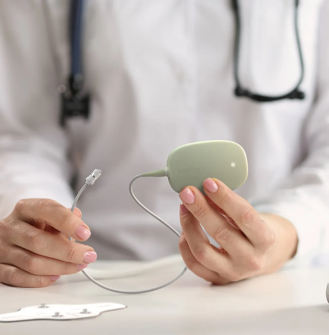 A doctor with a Biomaker in their hand.
