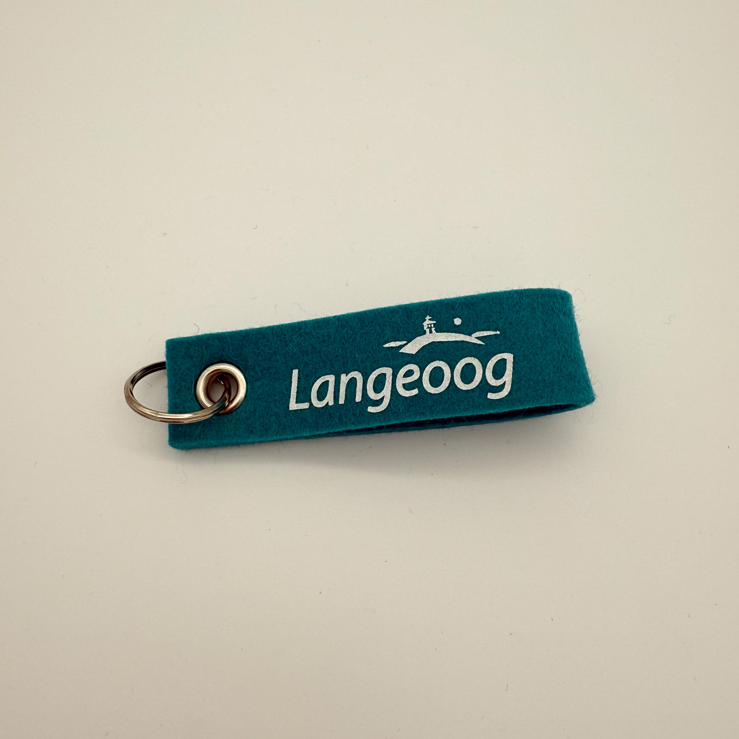 Langeoog Schlüsselanhänger aus Wollfilz in türkis