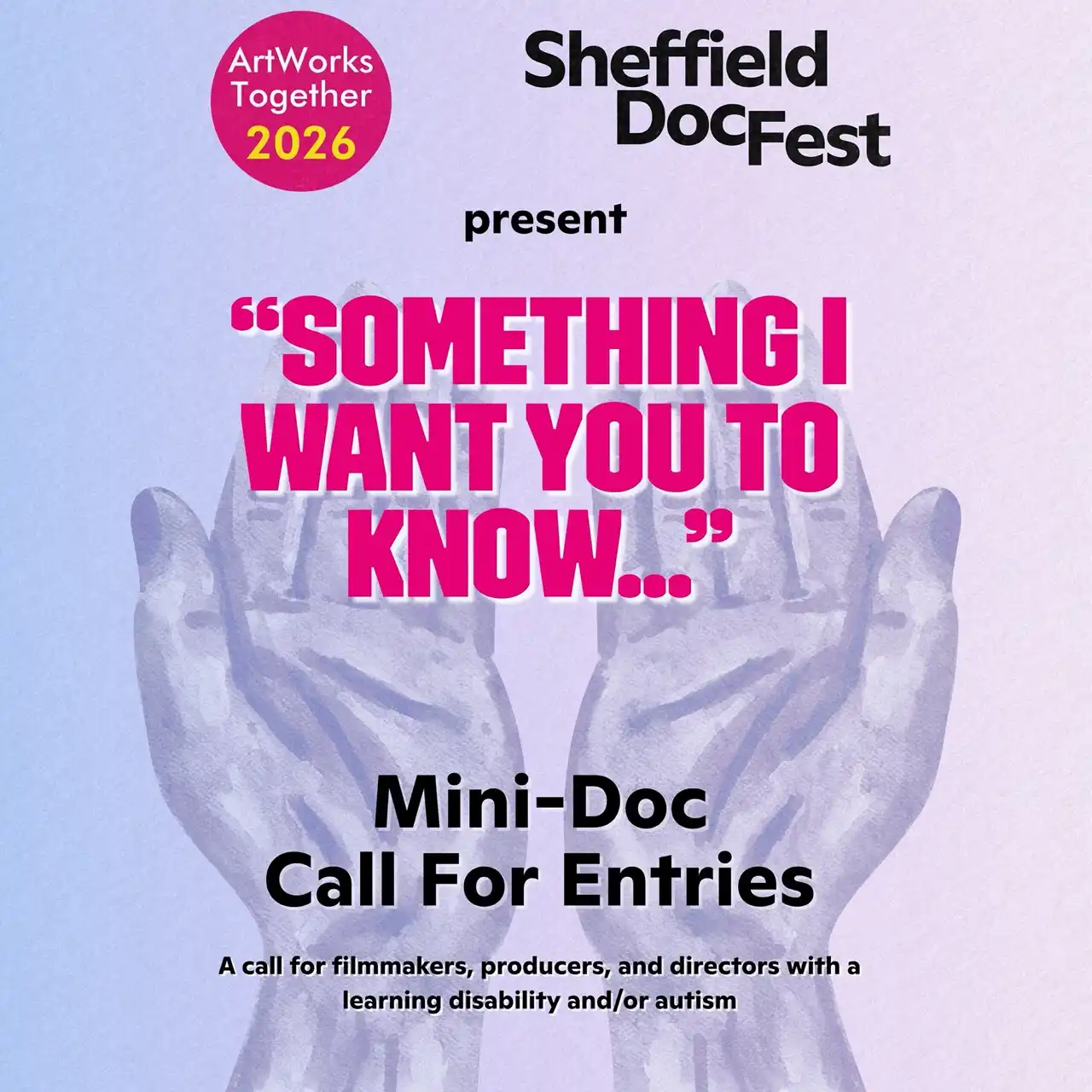 Jodie Cooper Jodie smiling sitting beside her sewing machine in her workspace.