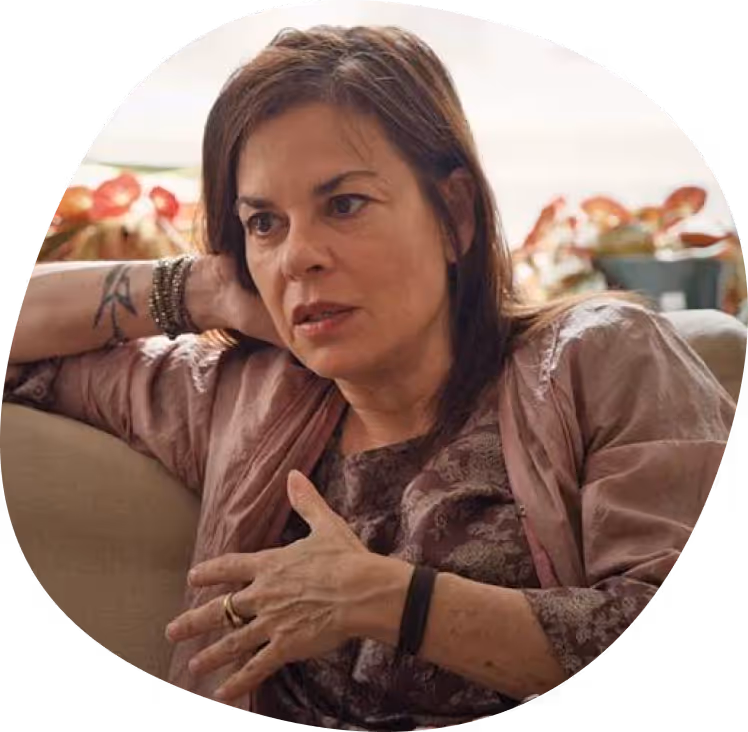 Therapist listening and talking during online session.