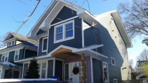 A blue house against a blue sky