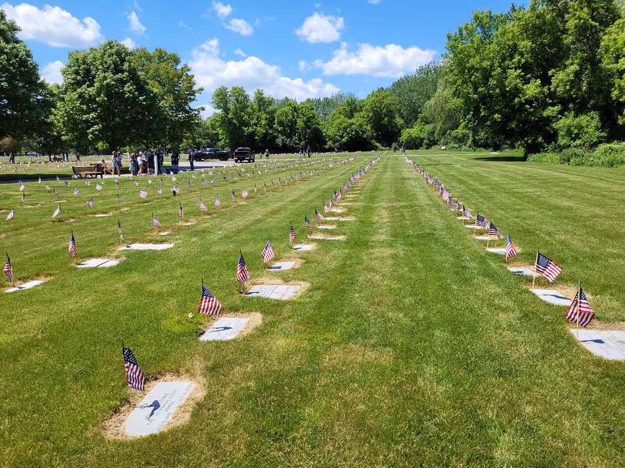 Memorial Day flags and gravestones