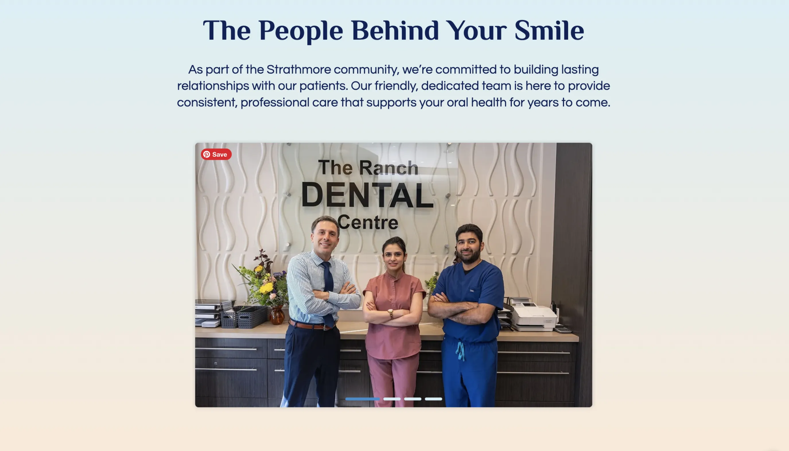 Three dental professionals standing with arms crossed in front of The Ranch Dental Centre sign inside a modern office.