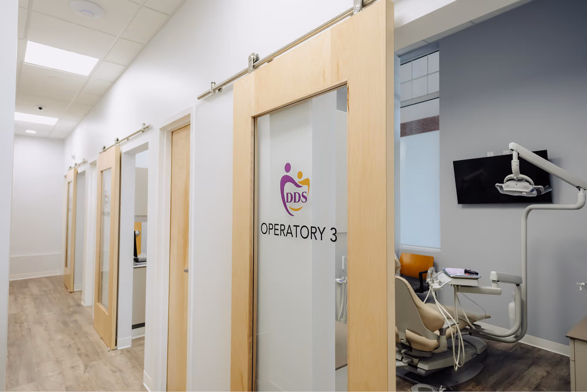 A room with a door that has a logo on it.