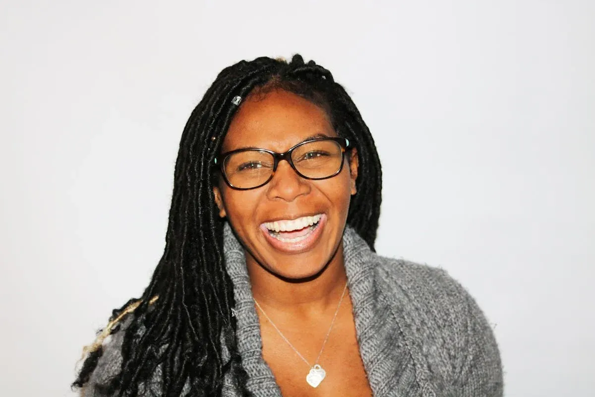 Smiling woman in glasses