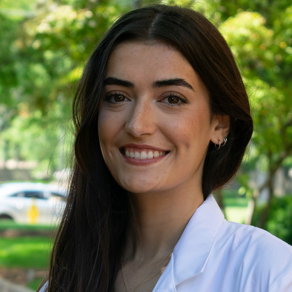 Portrait of smiling woman with long dark hair