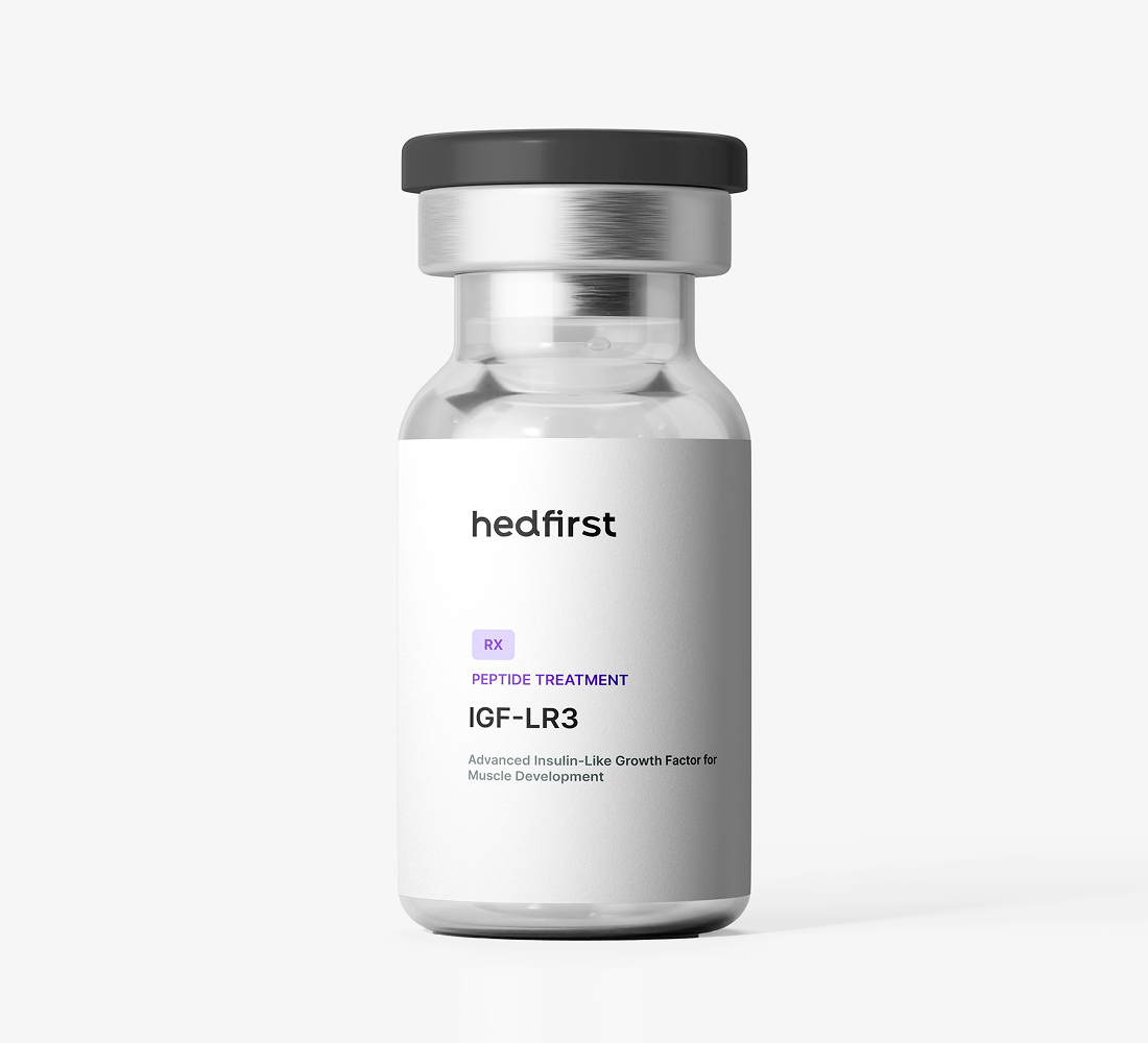 Small clear glass vial with black cap labeled Hedfirst IGF-LR3 peptide treatment on white background.