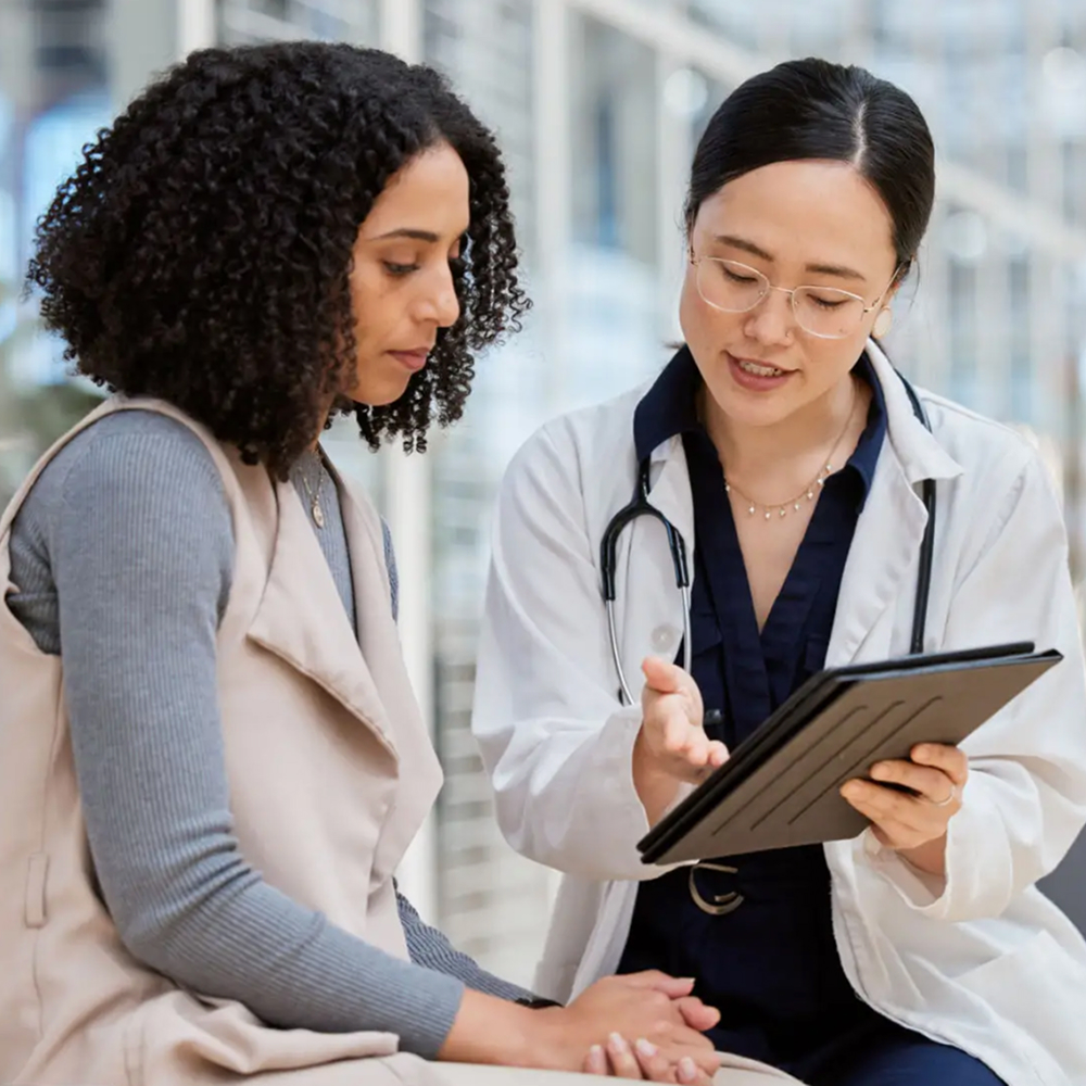 Doctor discussing treatment plan with patient experiencing sleep issues.