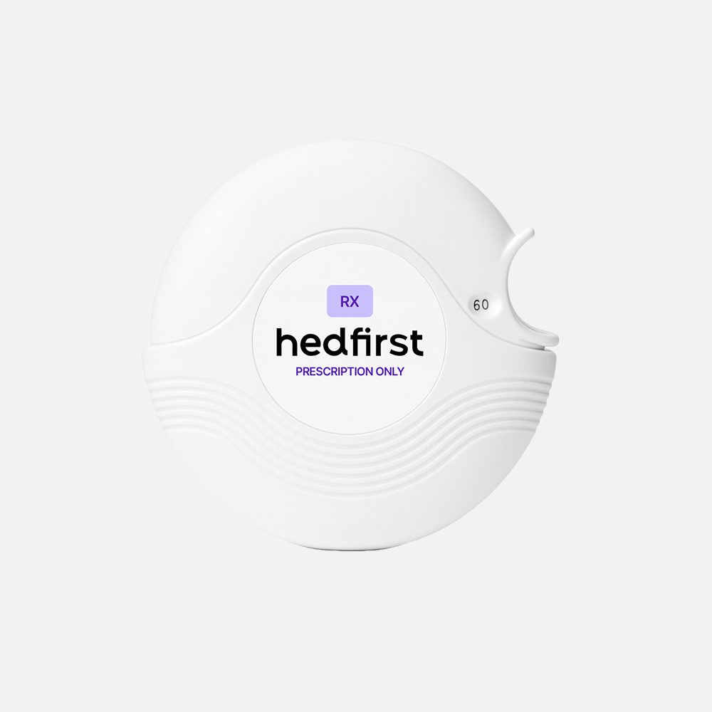 White prescription medication bottle labeled Hydroxyzine for non-habit forming anxiety relief on white background.