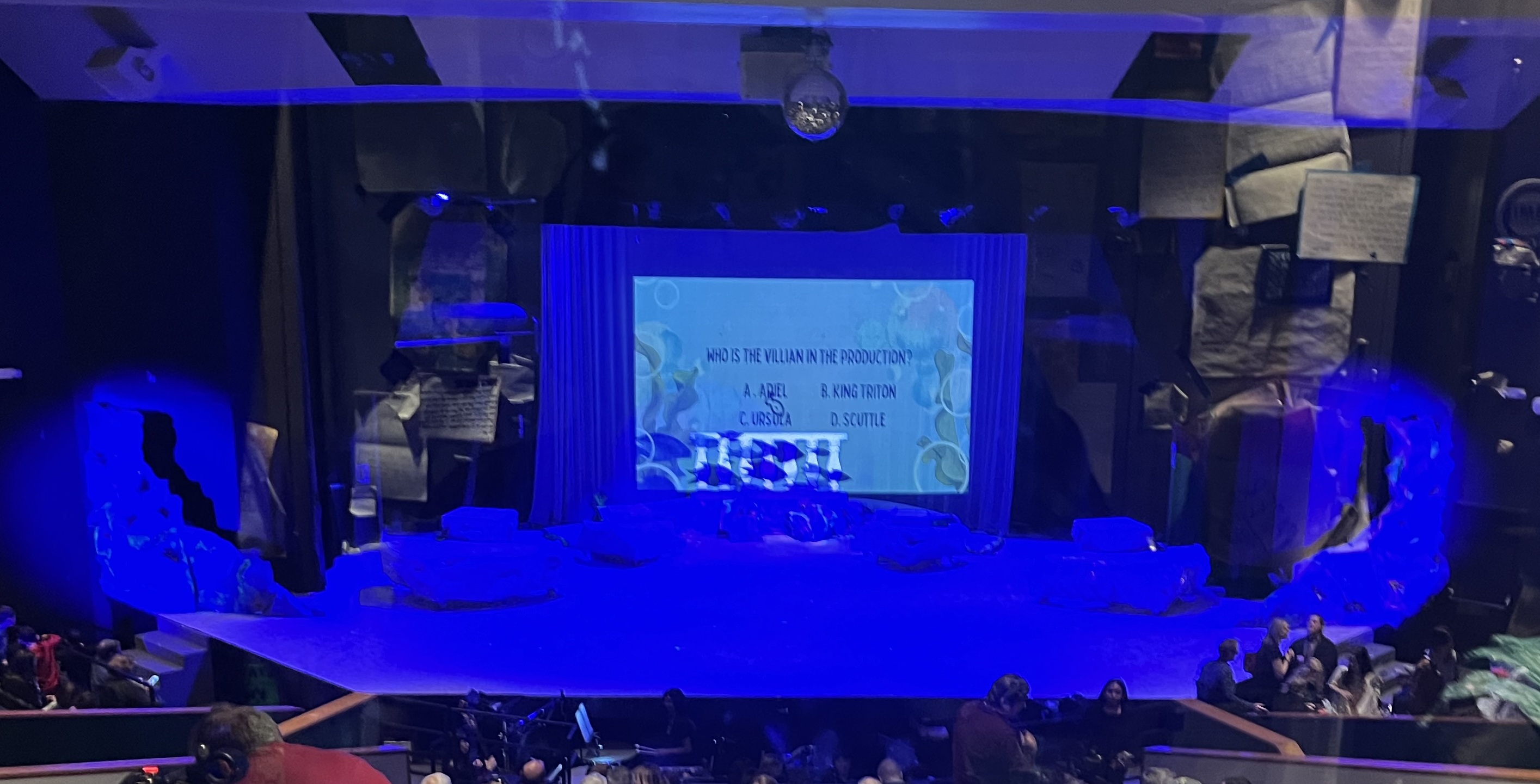 Here is a photo of our stage before the show started, we had trivia and lots of UV to bring out the UV Paint and Glow Paint that we had put on the set earlier in the week after rehersal.