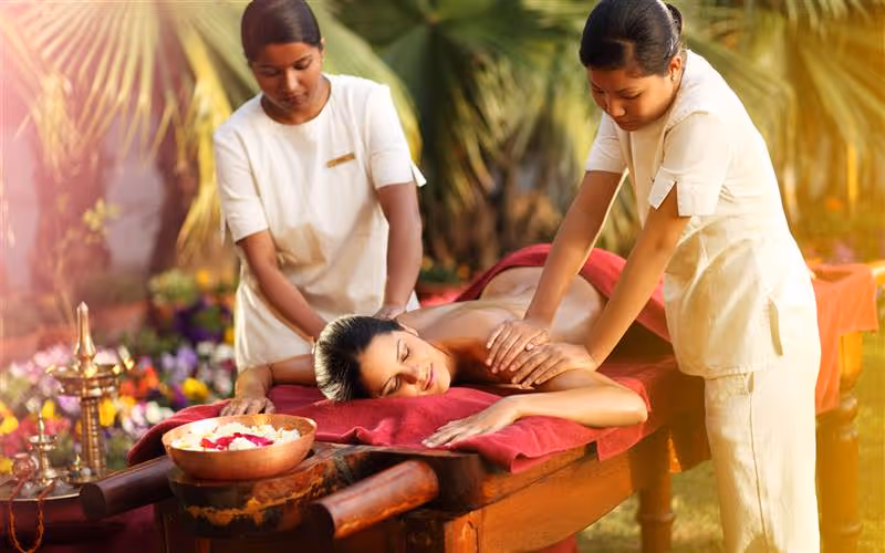 Guest and staff at Ananda in the Himalayas India wellness resort
