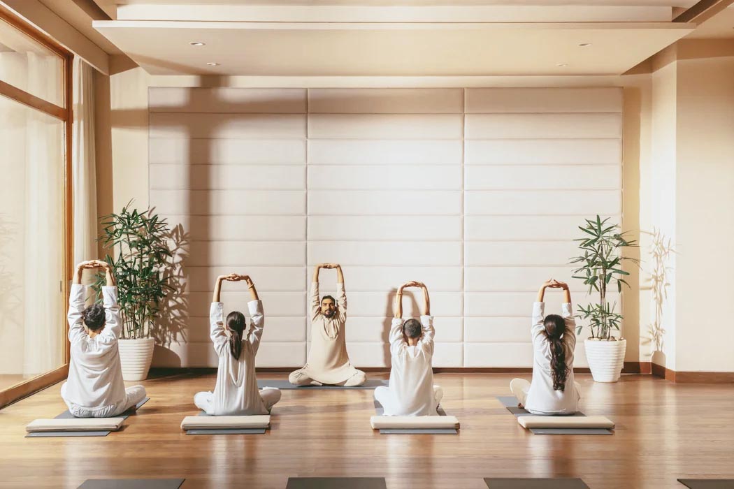 Guests and staff at Six Senses Vana India wellness resort