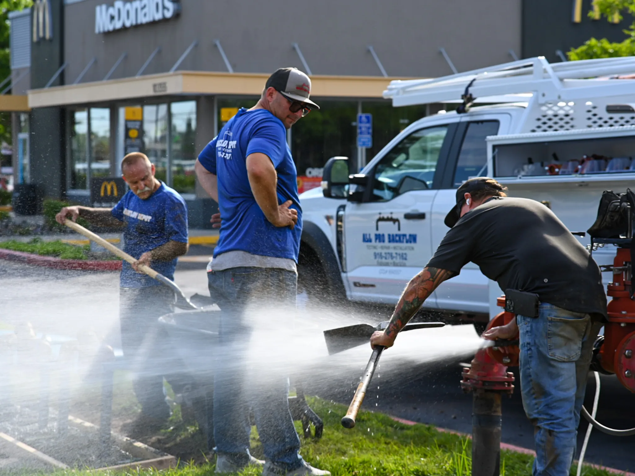 A man washing a pickaxe 