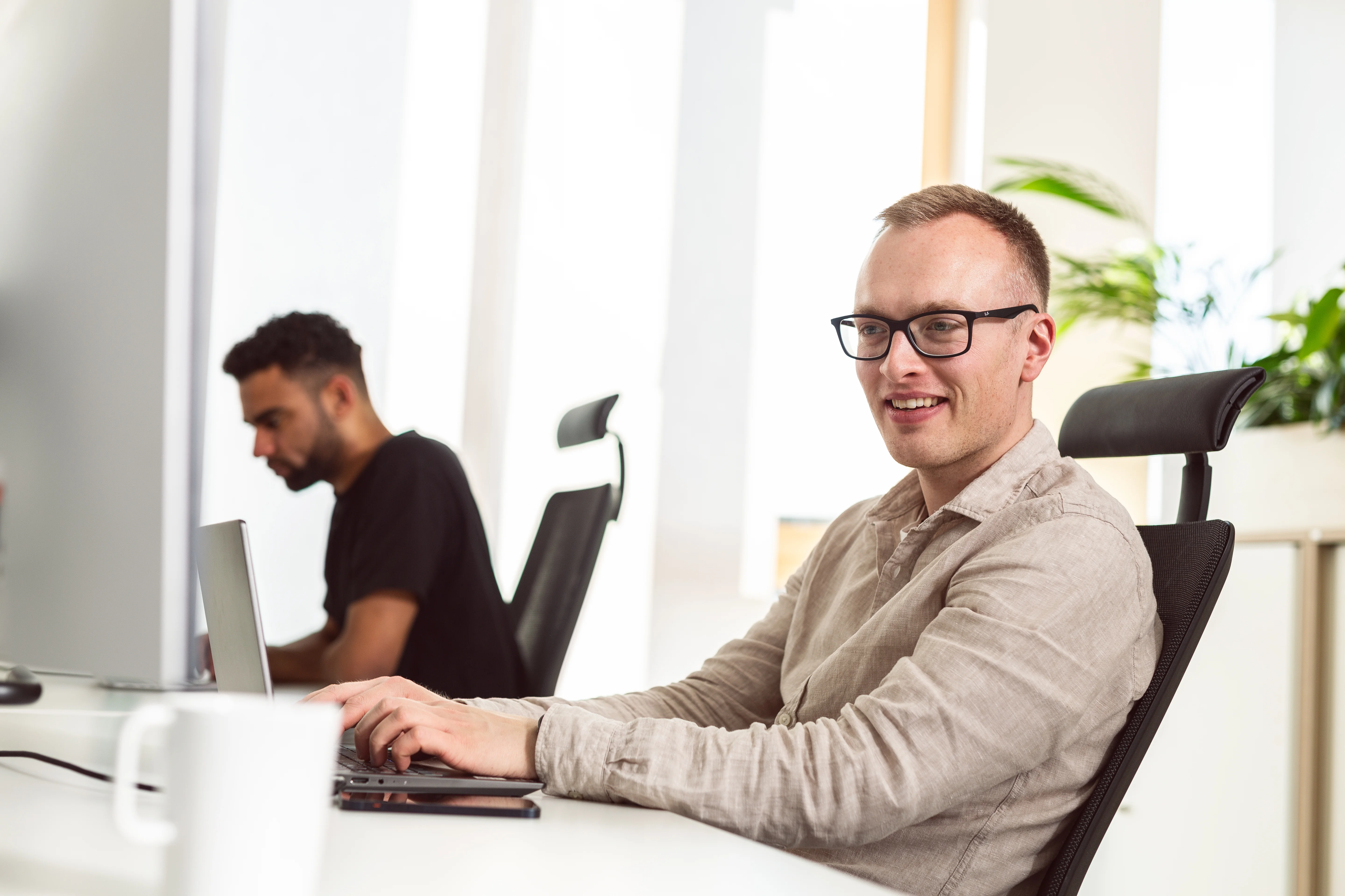 AMAI Team im Büro