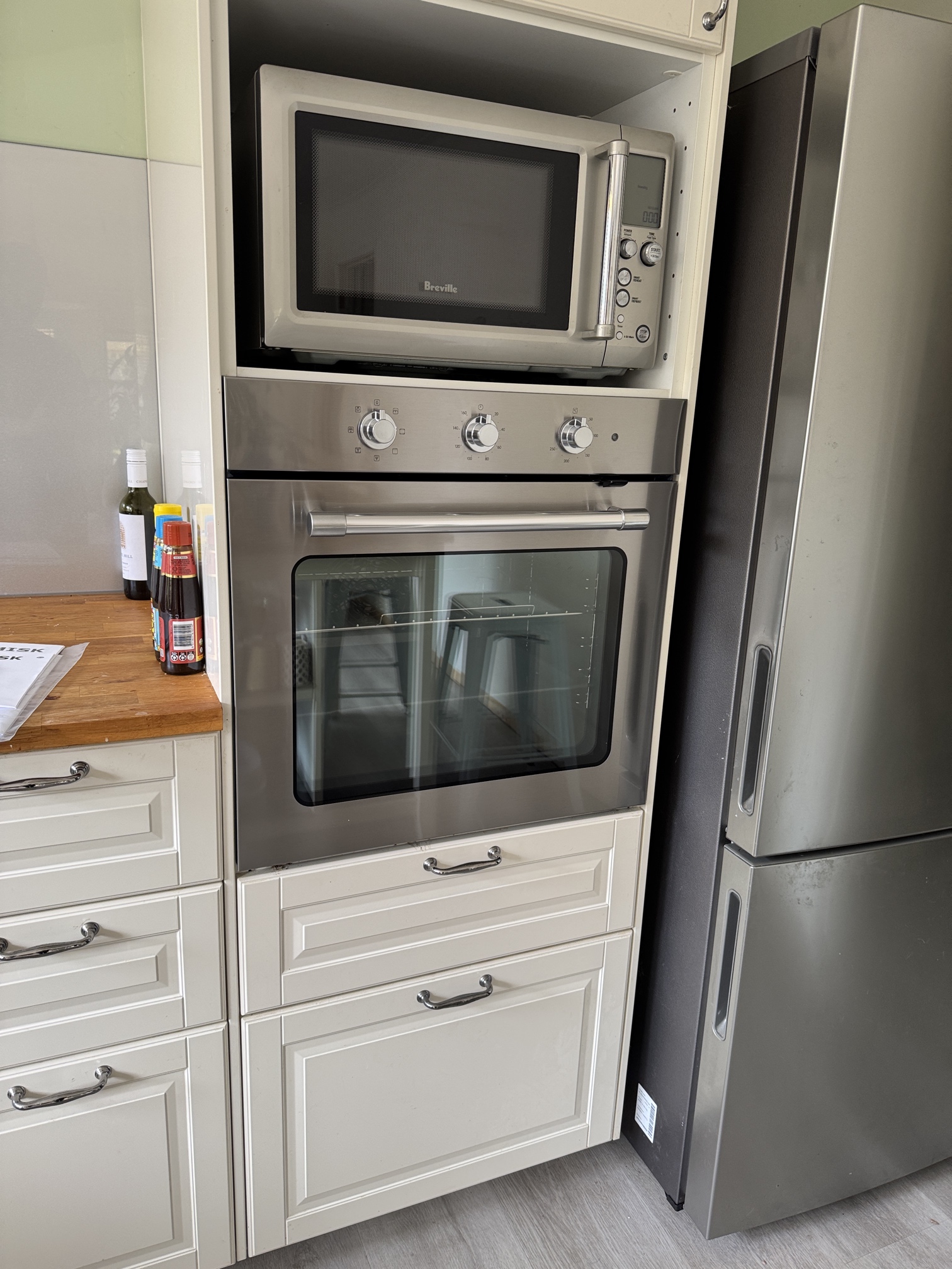 Ferguson Electrical oven installation and wall-mounted TV setup in Edithvale home.