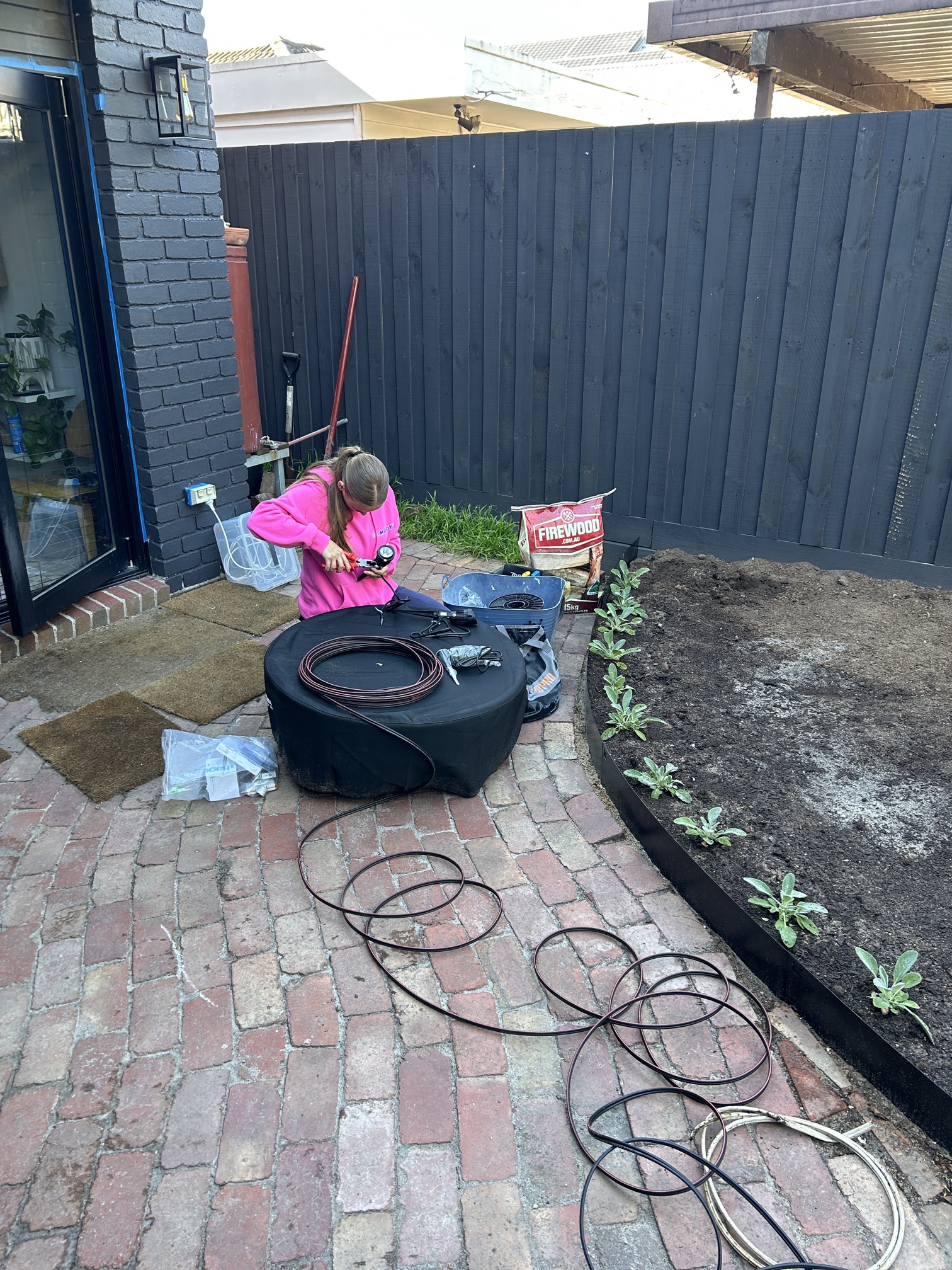 Garden lighting installation in landscaped backyard in Kew by Ferguson Electrical