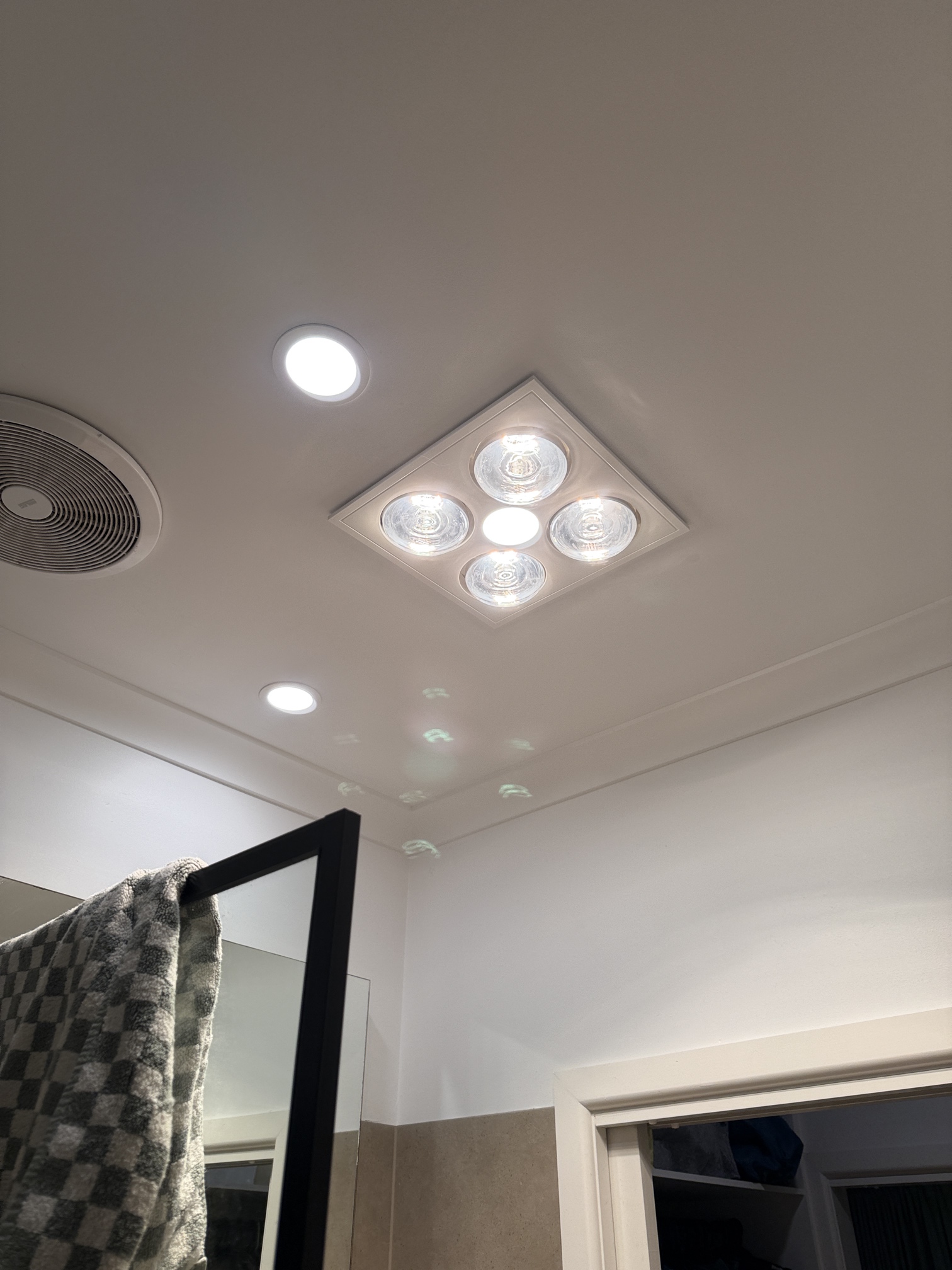 New bathroom heat lamp and exhaust fan installation completed by Ferguson Electrical in Carrum, Victoria.