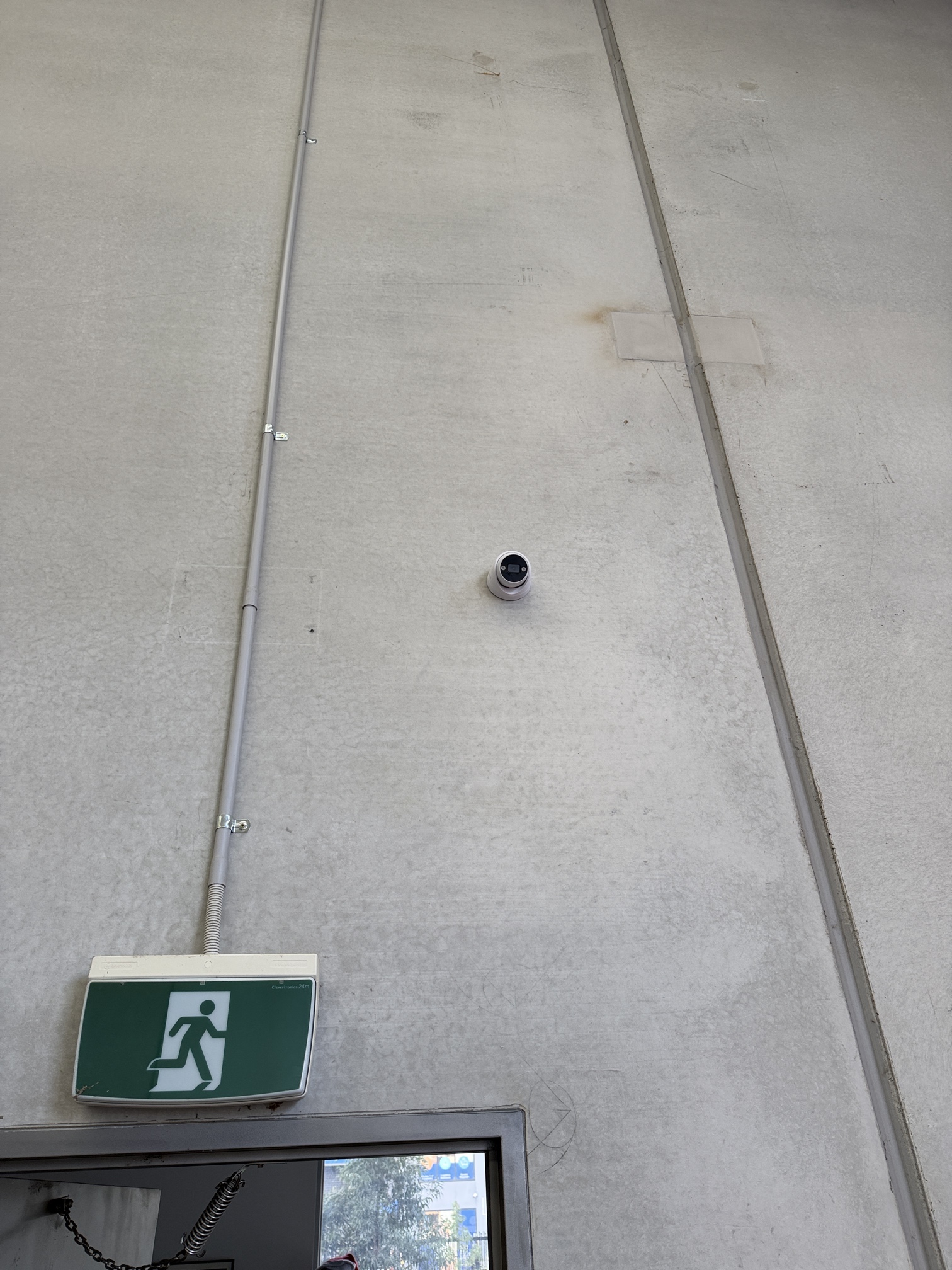 Swann Advanced AI CCTV camera professionally installed on the exterior of a medical manufacturing factory in Pakenham by Ferguson Electrical.