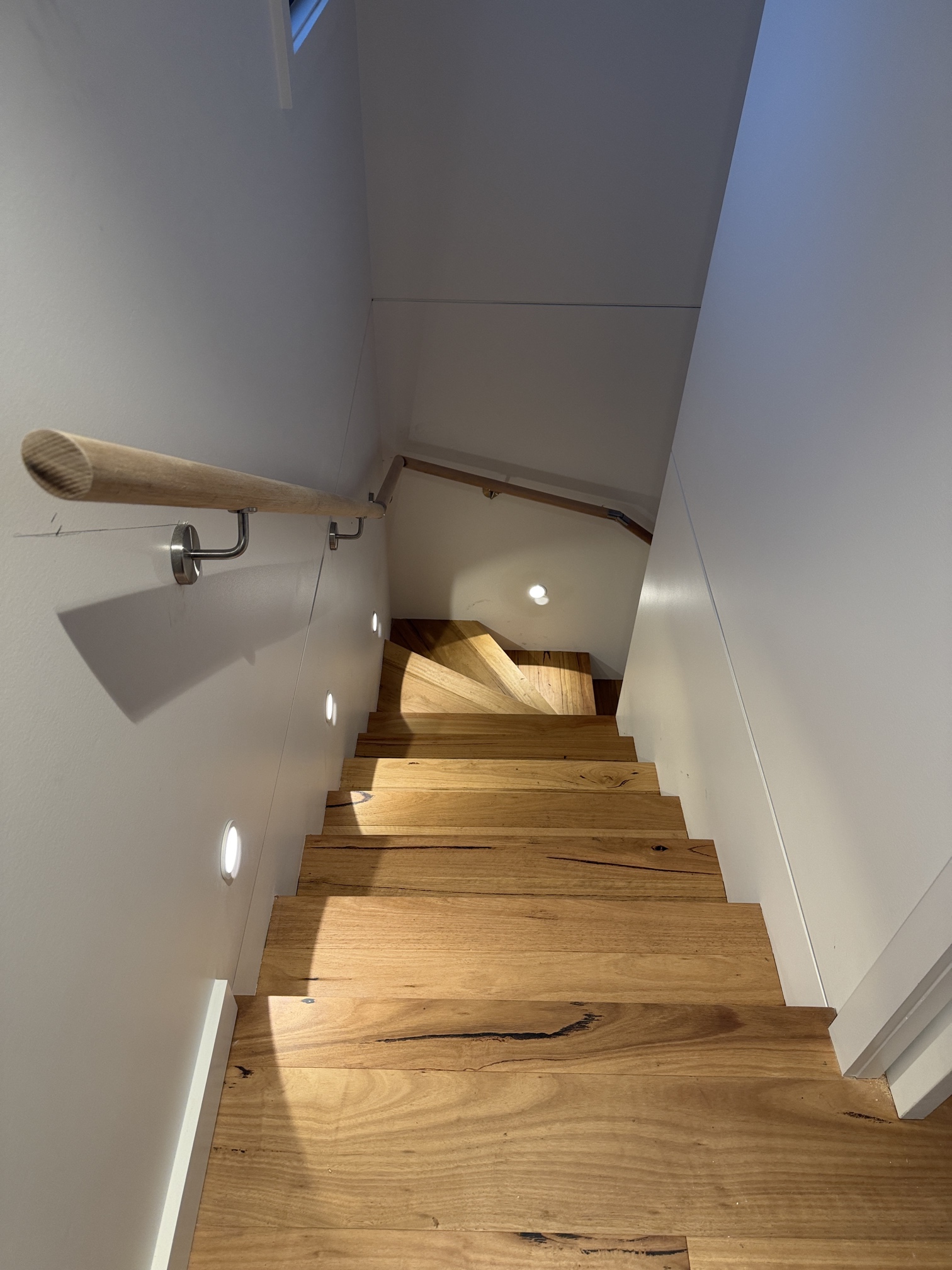 Modern Thornbury home renovation completed by Ferguson Electrical featuring architectural lighting, LED strip lighting, ceiling fans, bathroom lighting and premium electrical finishes.
