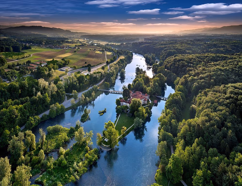 Otočec Castle on a river islet, Slovenia.