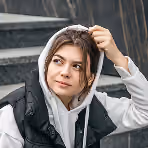 Young Female Student Stands With Digital Table Ther Hands Ooutside