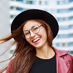 Lovely Girl With Candid Smile Posing Street