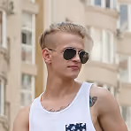Stylish Young Man With Tattoos Trendy Hairdo