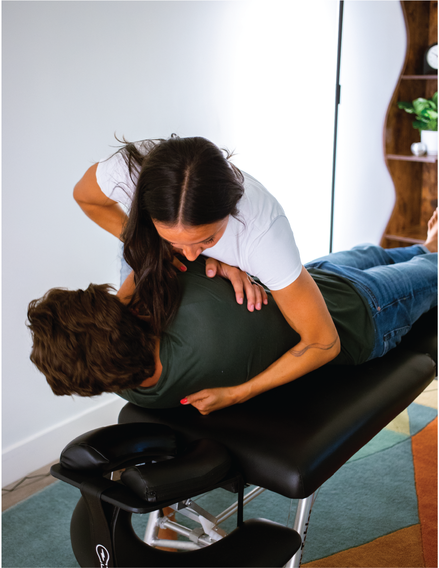 Liv the chiropractor adjusting client