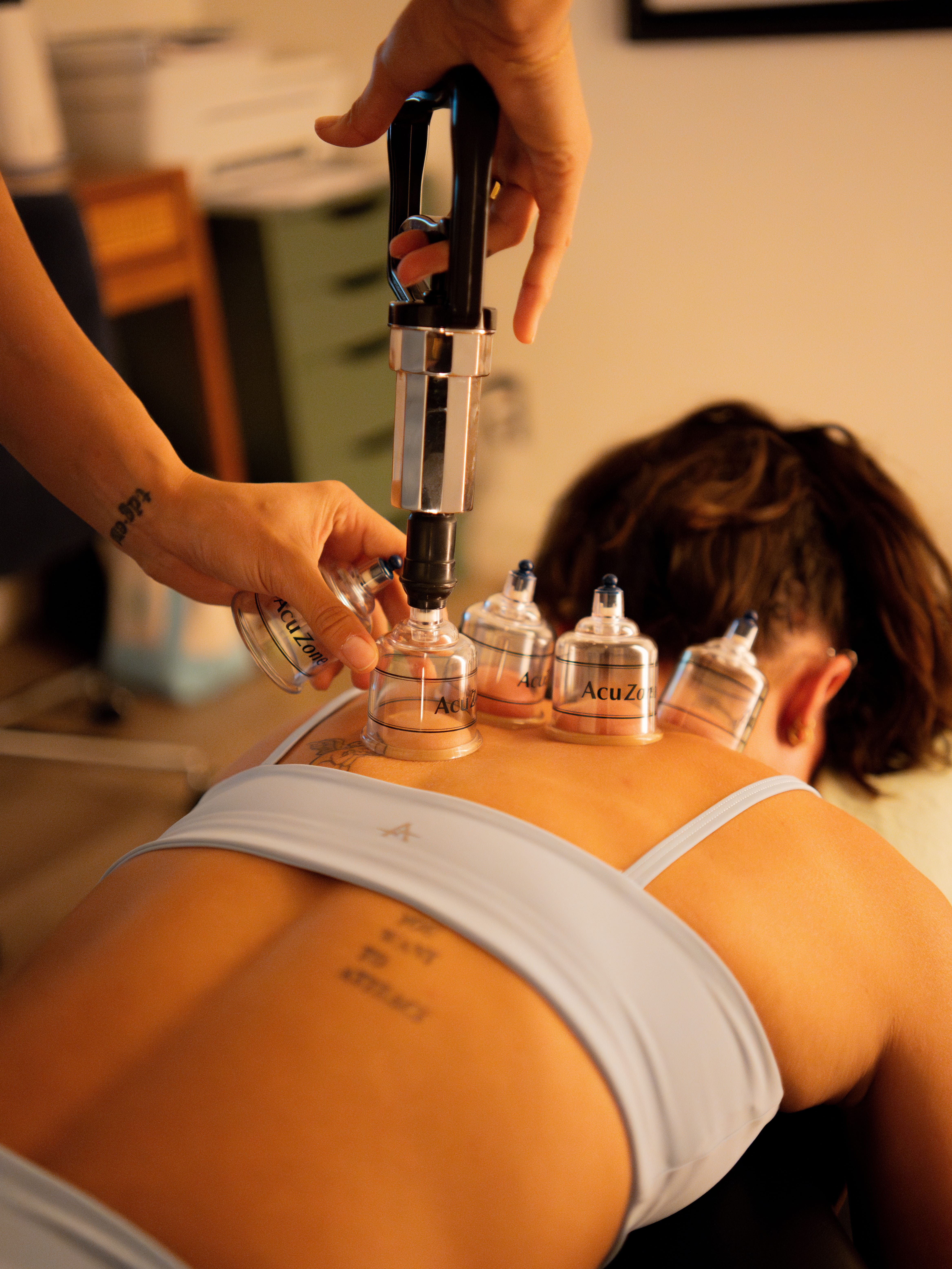 Liv the chiropractor adjusting client